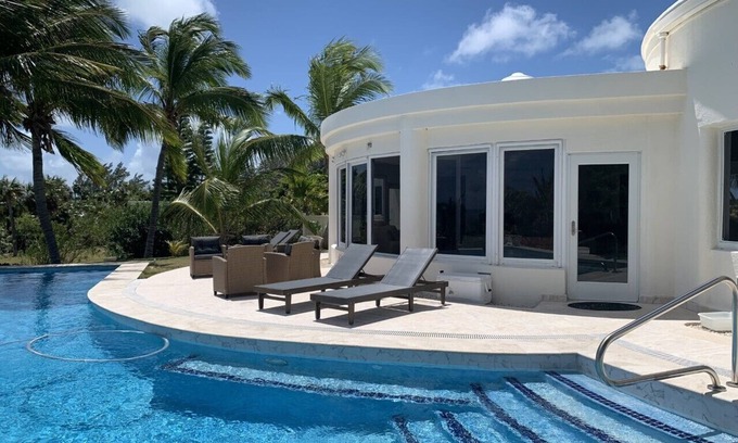 Double Bay House | Exquisite Contemporary Beachfront Estate with Pool on Pink Sand Beach