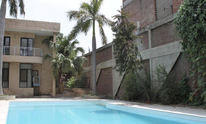 Agra Villa | Exquisite Villa: 4 BR with Huge Pool, Gardens, Indoor Fireplacenn