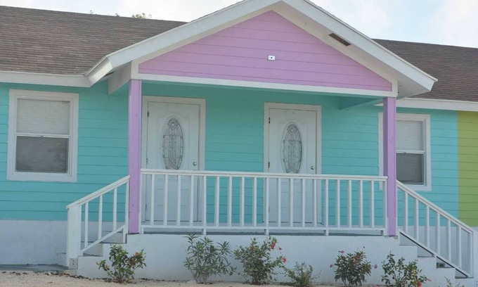 Rolleville Villa | Exuma Point - Swimming Pigs Resort Bougainvillea (Pink) Sunset Villa 1