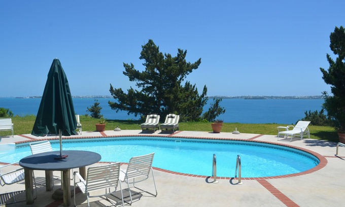 Sandys Apartment | Fabulous ocean view, private pool and garden, ideal location.