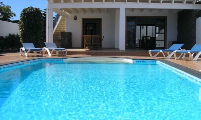 Playa Blanca Villa | Fabulous two bedroom, two bathroom villa, large pool and terrace with air con