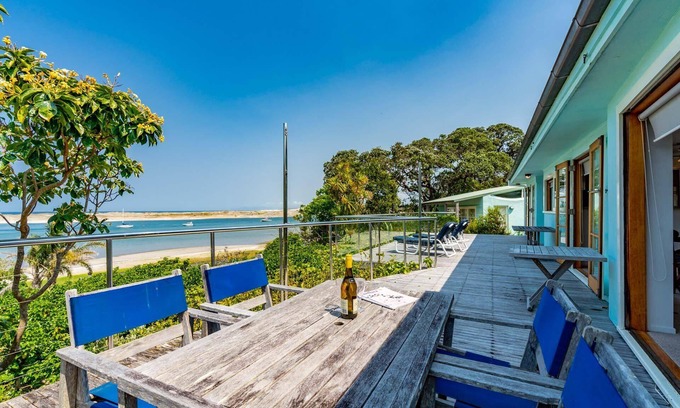 Mangawhai Heads House | Fairport House - Sunny holiday home with large decks, lovely views and a short stroll to the estuary