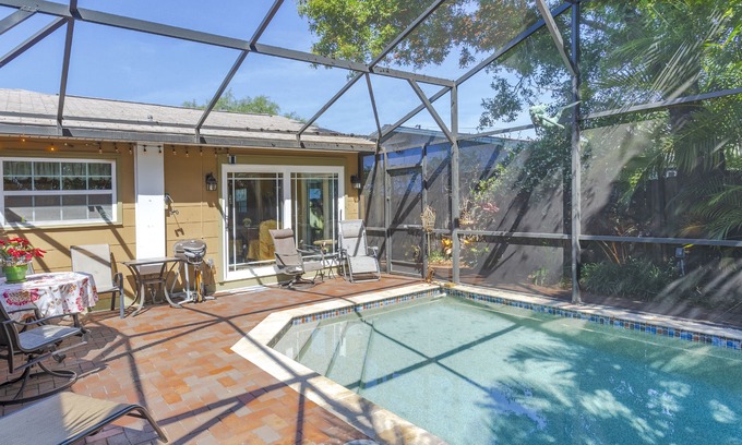 Gulfport Cottage | Family and dog friendly beach cottage w/pool & grill in quaint seaside village