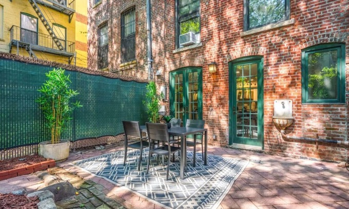Central Park North House | Family Brownstone with Private Backyard Near Subway