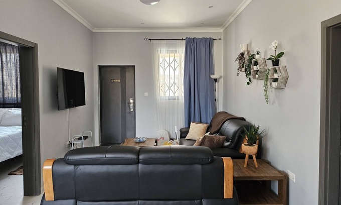 Lusaka Villa | Family & business friendly solar powered luxury 2 bed home with private pool