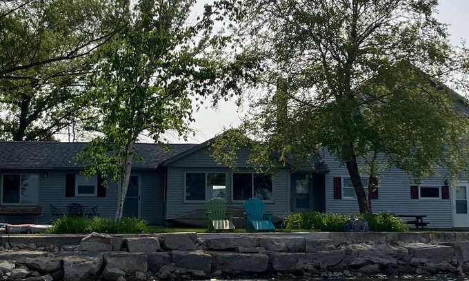 Sturgeon Bay Cottage | Family cottage on the water in Door County. Water toys for adults and kids.