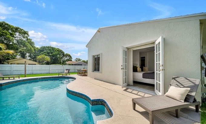 Royal Palm Beach House | Family Friendly 4BR Home with a Private Pool & Calm Farmhouse Charm
