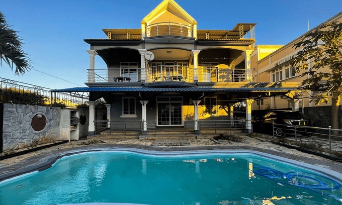 Mont Choisy Apartment | Family-friendly 2-bedroom apartment with pool - 5 minutes walk to the beach