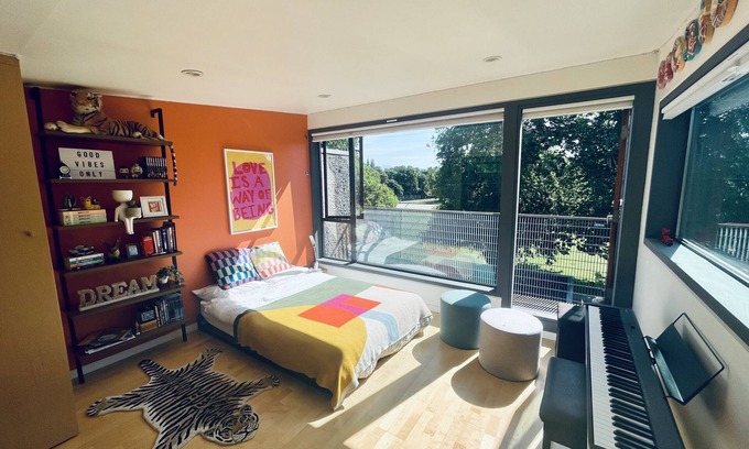 East Side House | Family-friendly 3-bedroom modern home w/hot tub on park & 15 min to downtown!