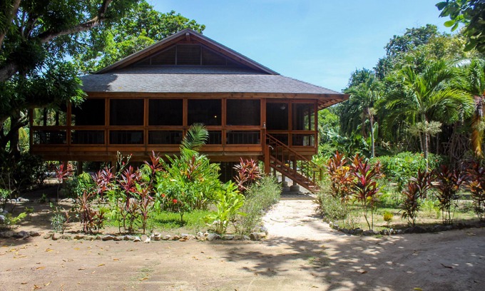 Palmetto Bay House | Family Friendly Beach Bungalow. Private Eco Dive Resort With A Pool & Beach
