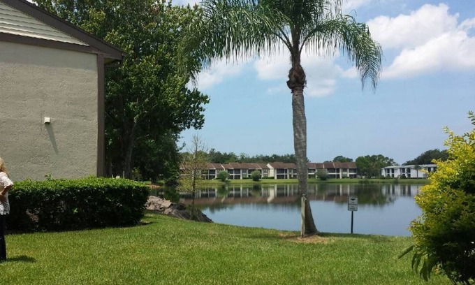 Oldsmar Condo | family friendly, gated community, two pools, lake outside back door.
