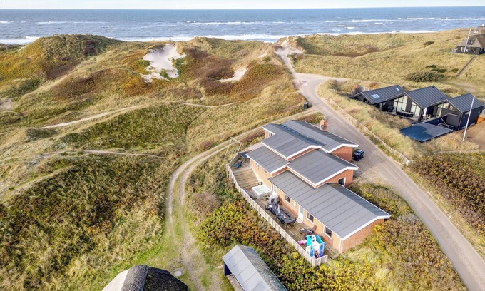 Sondervig House | Family-friendly holiday home with indoor pool and outdoor spa 100 meters from the North Sea.