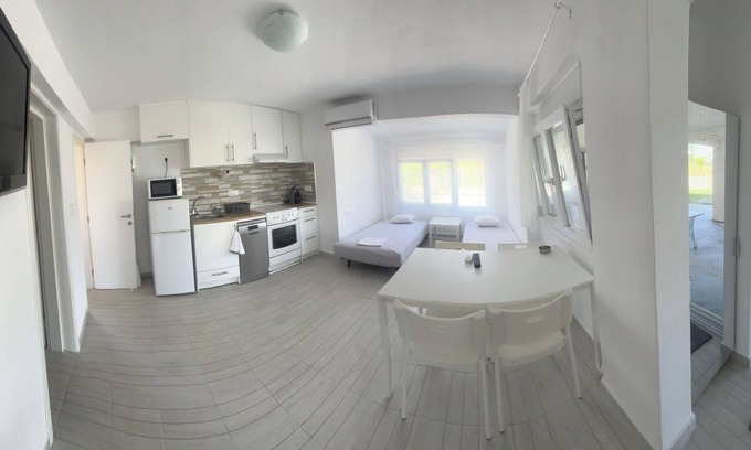 Nea Mesagkala Apartment | Family friendly quiet apartment with garden, near the sea