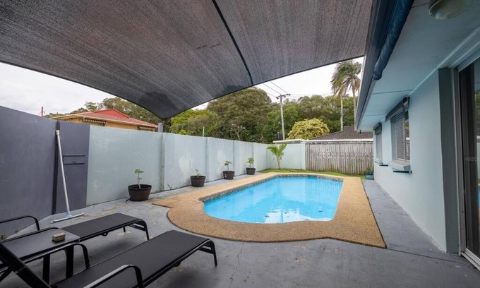 Bundall House | Family-Friendly Retreat with Pool & Spacious Living