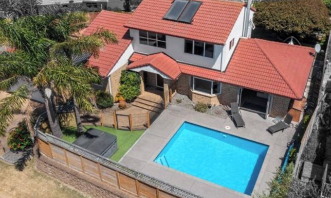 Papamoa Beach House | Family Friendly Retreat: Heated Pool, Spa, 5min walk to beach