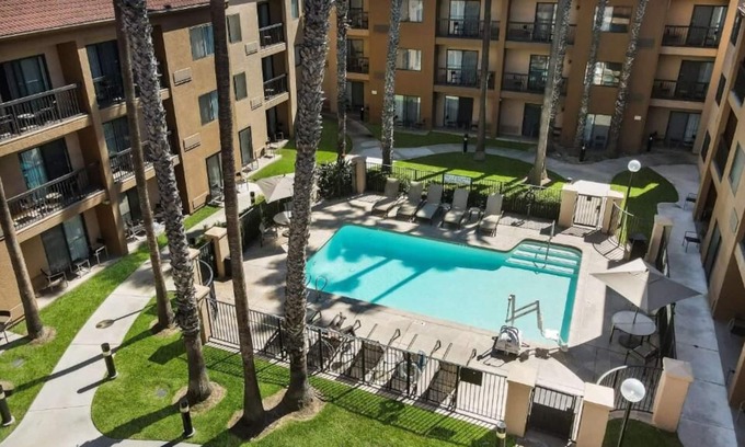Downtown Village House | Family-friendly Getaway! Spacious Suite w/ Pool View, Outdoor Pool, Pets Allowed