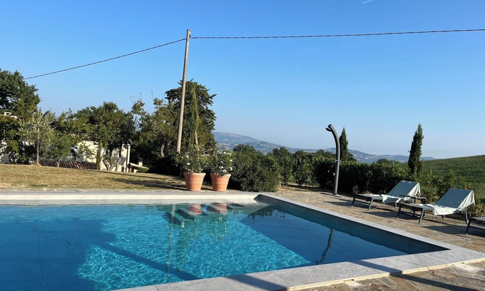 Pergola House | Family holiday home with great view, heated pool and pizza oven