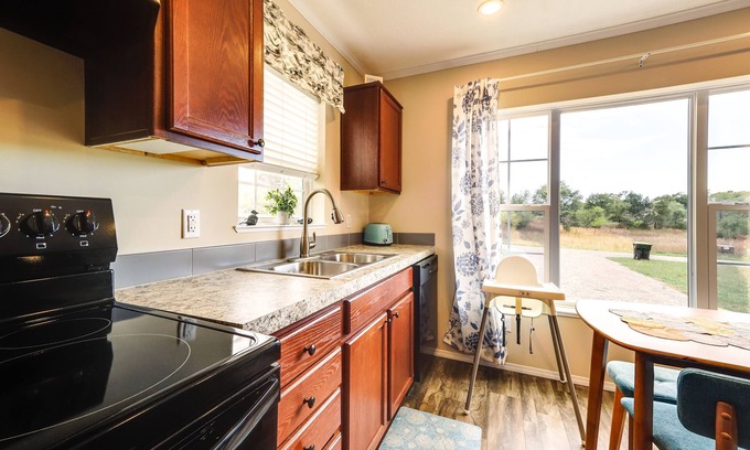 Rapid City Cottage | Family Home in Rapid City ~ 4 Mi to Torch Lake!