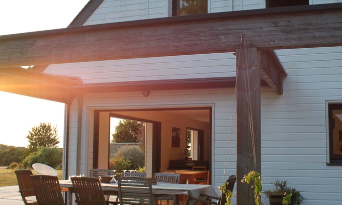 Plougoumelen House | Family home with multiple living spaces, open views and stunning sunsets