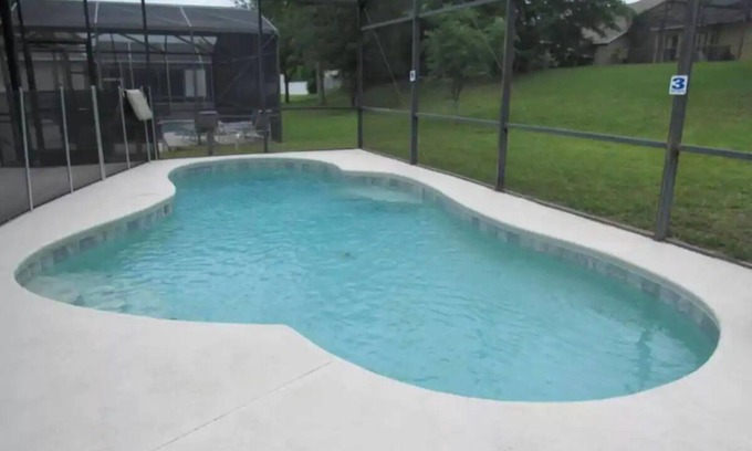 Legacy Park Villa | Family home with private pool 20 minutes from Disney.