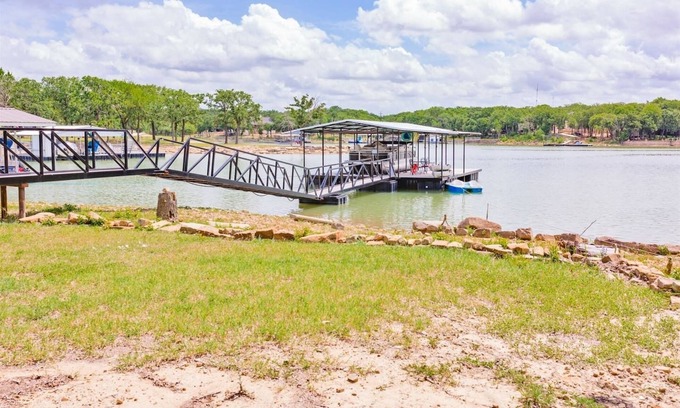 Chico House | Family lake front home with dock, kayak, outdoor kitchen and more
