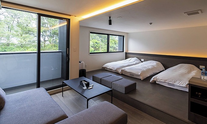 Akaogi Hotel | Family room modern kitchen with stove/Oshimagun Kagoshima