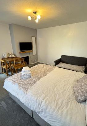 Patchway House | Family room, Shared House
