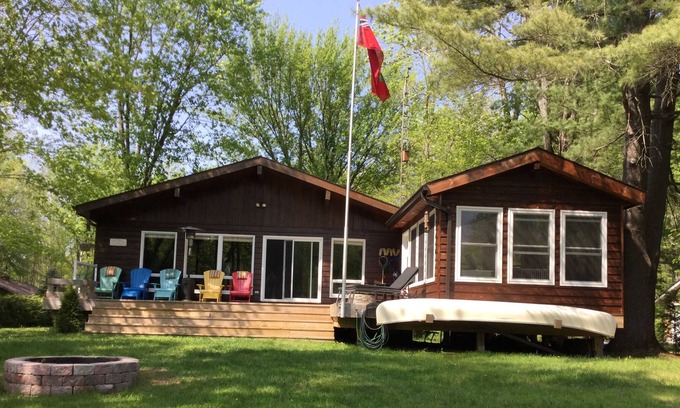 Washago House | Family sized cottage with dock,deck,gazebo,firepit,small sandy beach.
