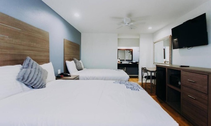 Clear Lake Shores Hotel | Family Stay Right off Route 146 | Relax at Deck with Marina Views