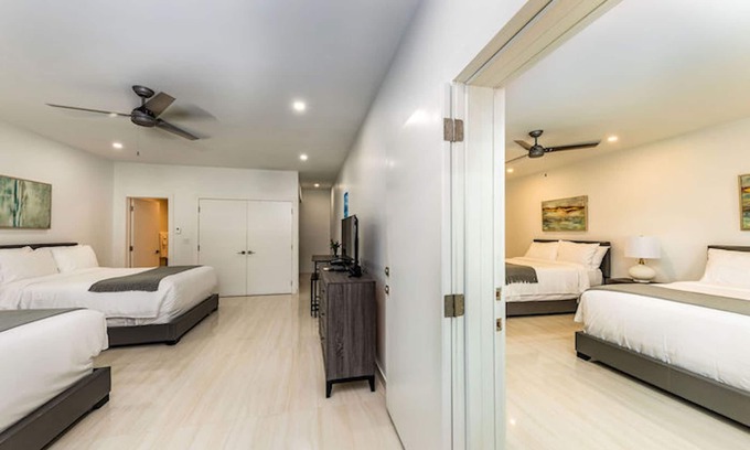 The Bight Hotel | Family Suite — 4 Queen Beds, Sleeps 8 — Pool, Bikes, Steps to Grace Bay Beach