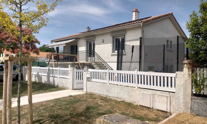Quartier du Stade House | Family townhouse with garden close to shops and beach.