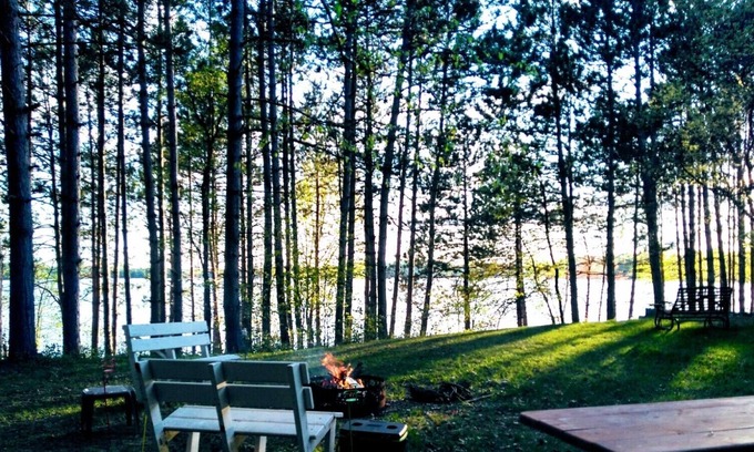Jim Falls House | Family vacation lake home with a beach, dock, and boats on Fireside Lake.