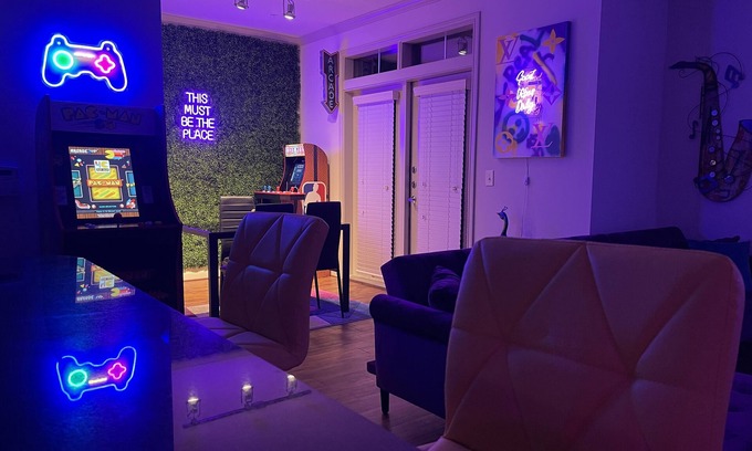 South Main Apartment | Fancy Purple Las Vegas Hotel Theme w/Arcade Games