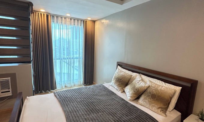 Wack-Wack Greenhills Condo | Fantastic 2-bedroom condo with AC IN BSA TWIN TOWER