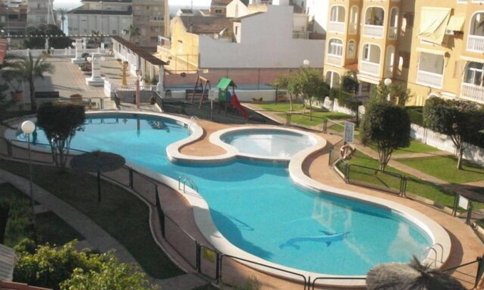 Coveta Fuma House | Fantastic 4 bedroom Townhouse close to the Beach with a Communal Swimming Pool