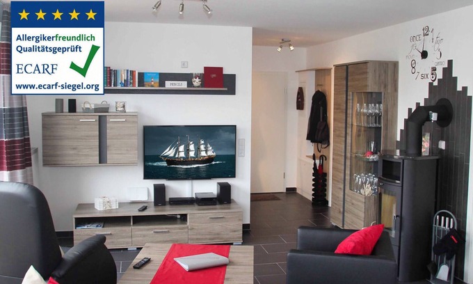 Grossenbrode Apartment | Fantastic apartment with fireplace, rain shower and sauna, wireless internet