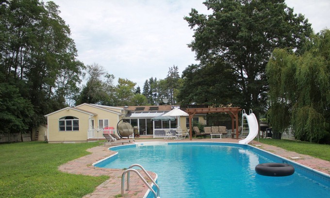Riverhead House | Farmhouse near beach, with large pool, farm animals