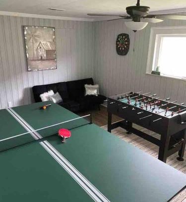 Johnson City House | Farmhouse with game room, fire pit and creek