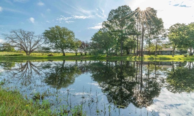 Canton Other | Farmhouse with pond at Canton Trade Days entrance