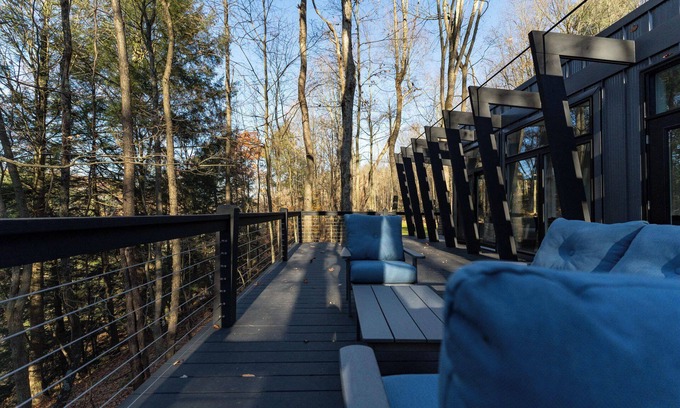 Loudonville Cabin | Fauna Bluff, A cliffside 2-bedroom modern cottage overlooking a bubbling stream.