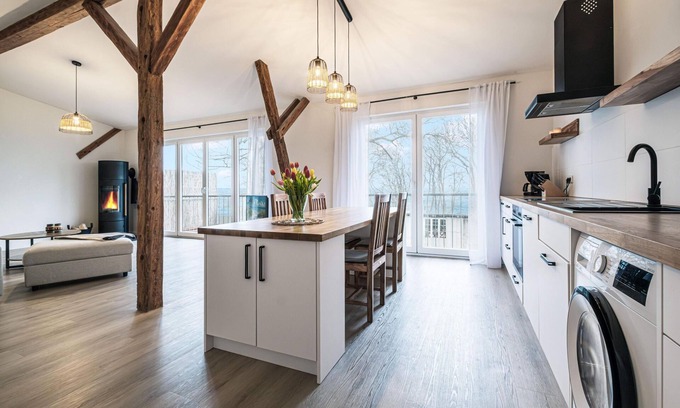 Steinbergkirche Apartment | Favorite place by the sea - east barn on Mühlendamm with sea view, stove and sauna