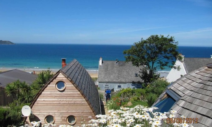 Locquirec House | Feet in the water, wooden house with terrace, breathtaking sea view.