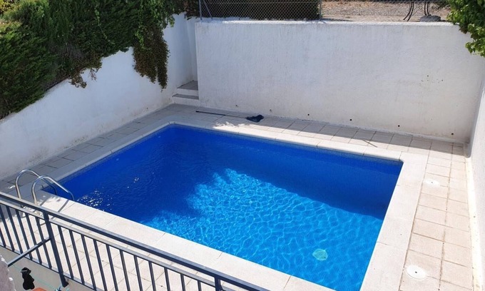 Llanca Apartment | FENER DE BAIX 4 Fantastic apartment with pool and see views.