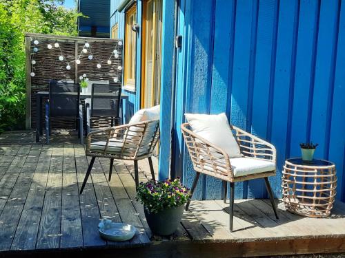 Bremke House | Ferienhaus "Auszeit mit Herz" im Ferienpark Extertal - Kamin, Fass-Sauna, Massagesessel