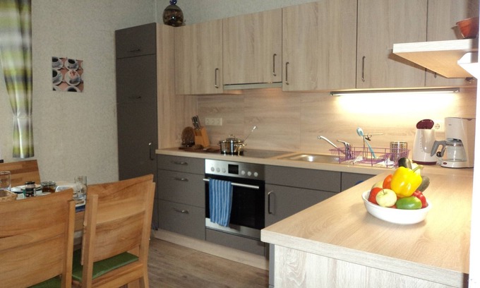 Ebern Apartment | Ferienhaus für bis zu 8 Personen mit Balkon, Terrasse und kleinem Garten