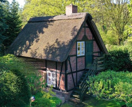 Sankt Dionys House | Ferienhaus unter Reet im Heidedorf Sankt Dionys bei Lüneburg