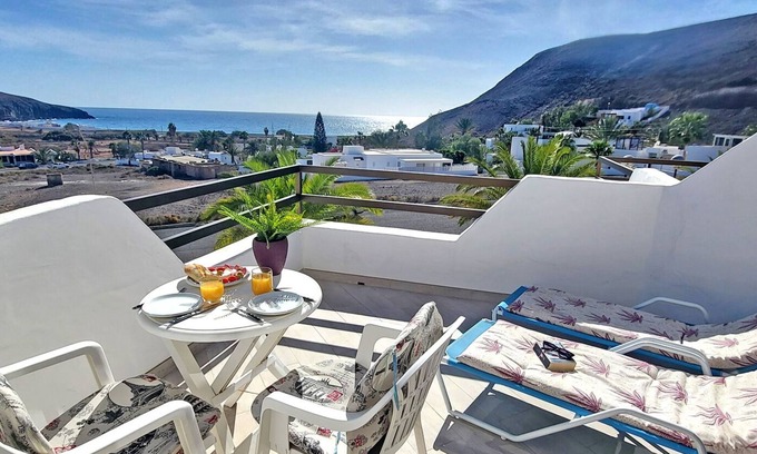 Giniginamar Apartment | Ferienwohnung Aurora in Giniginamar, Meerblick, Gemeinschaftspool