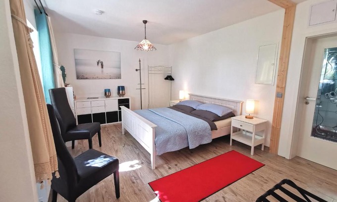 Kamin Apartment | Ferienwohnung "Carinerland" mit Terrasse in Ostseenähe