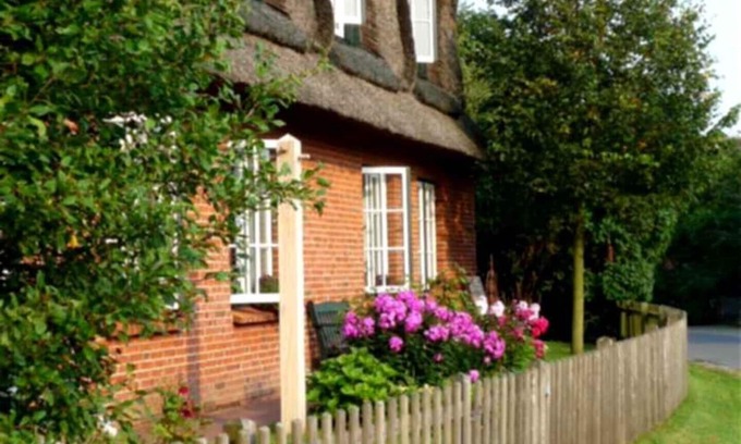 Norddeich Apartment | Ferienwohnung "mohnzimmer" mit ca. 45qm - Das Deichhaus