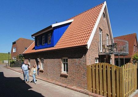 Neuharlingersiel Apartment | Ferienwohnungen Haus Hafenperle